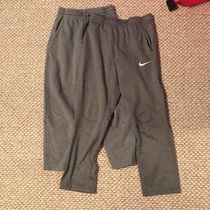 2 grey Nike sweatpants.